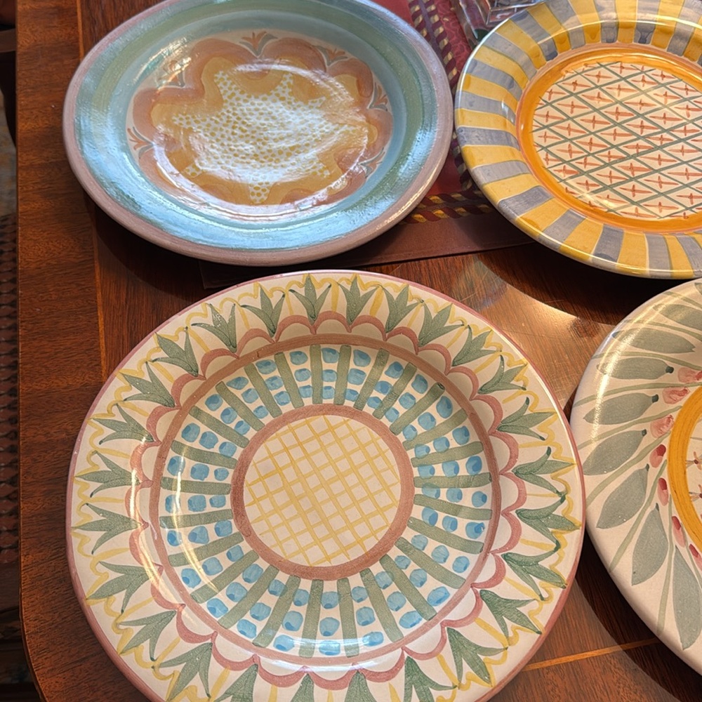 5 piece place setting of Mackenzie Childs
Dinnerware.